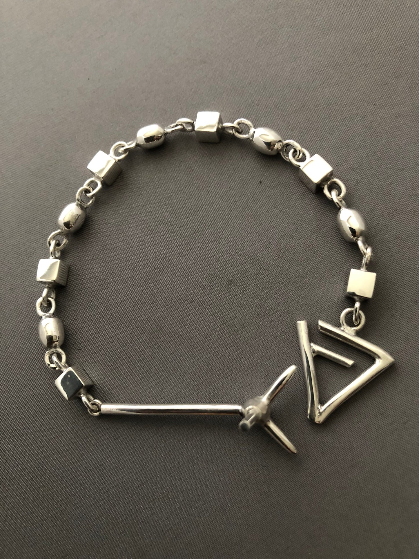 Men’s solid silver spike bracelet