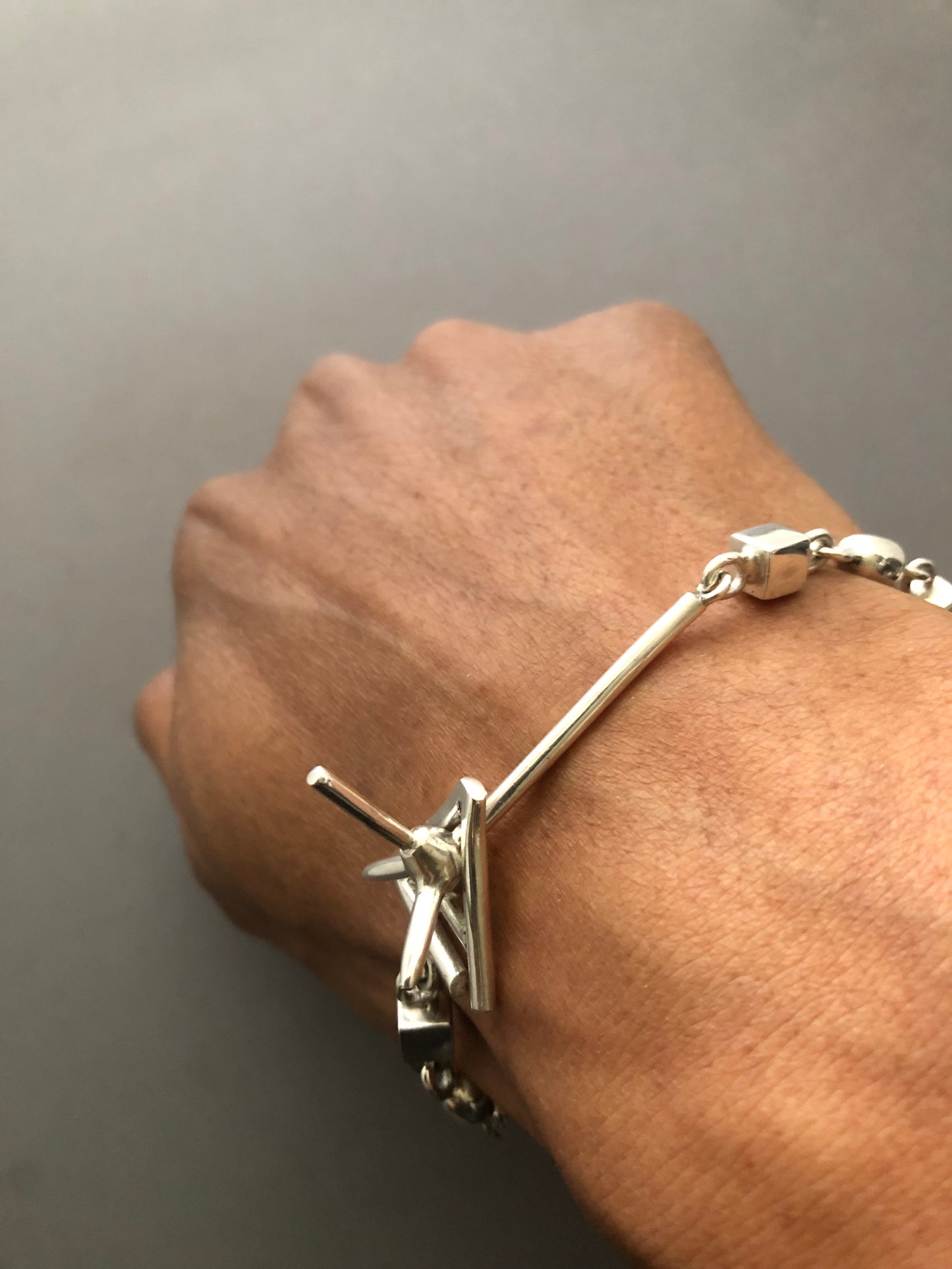 Men’s solid silver spike bracelet