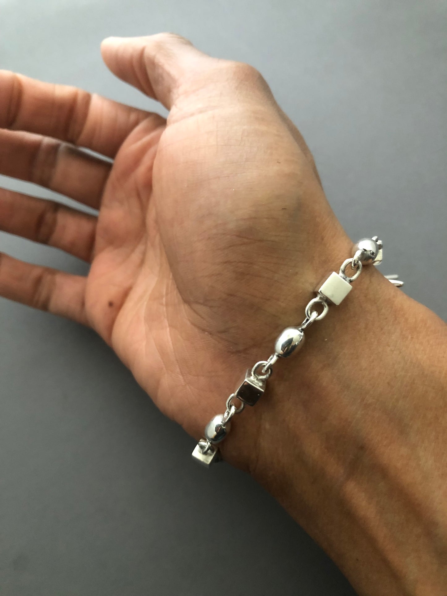 Men’s solid silver spike bracelet