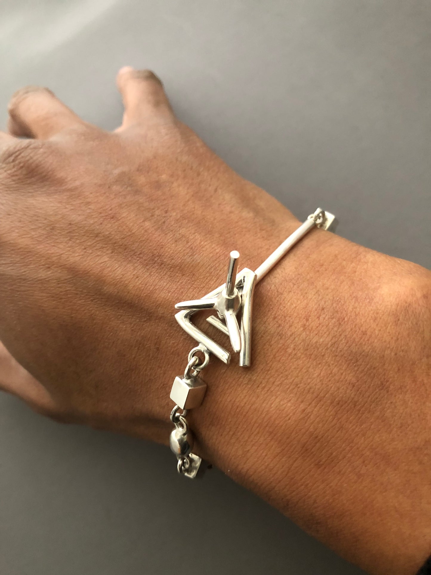 Men’s solid silver spike bracelet