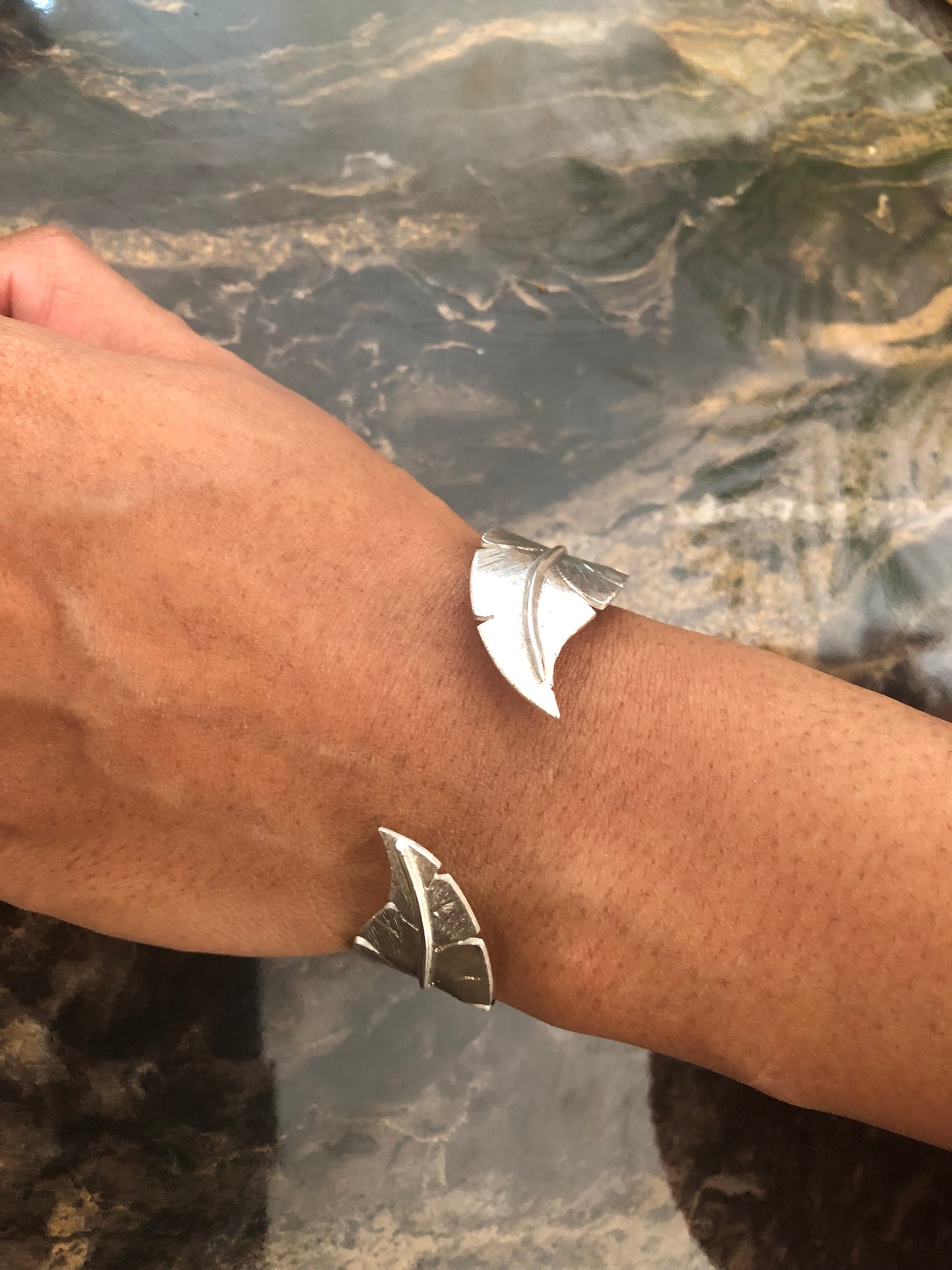 Ladies solid silver feather bangle