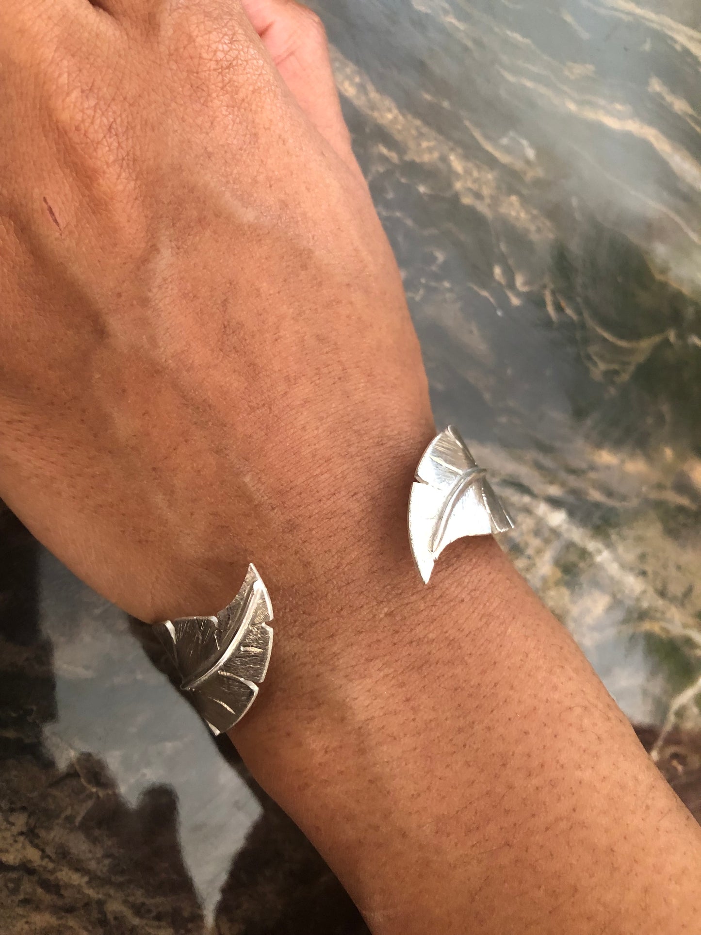 Ladies solid silver feather bangle