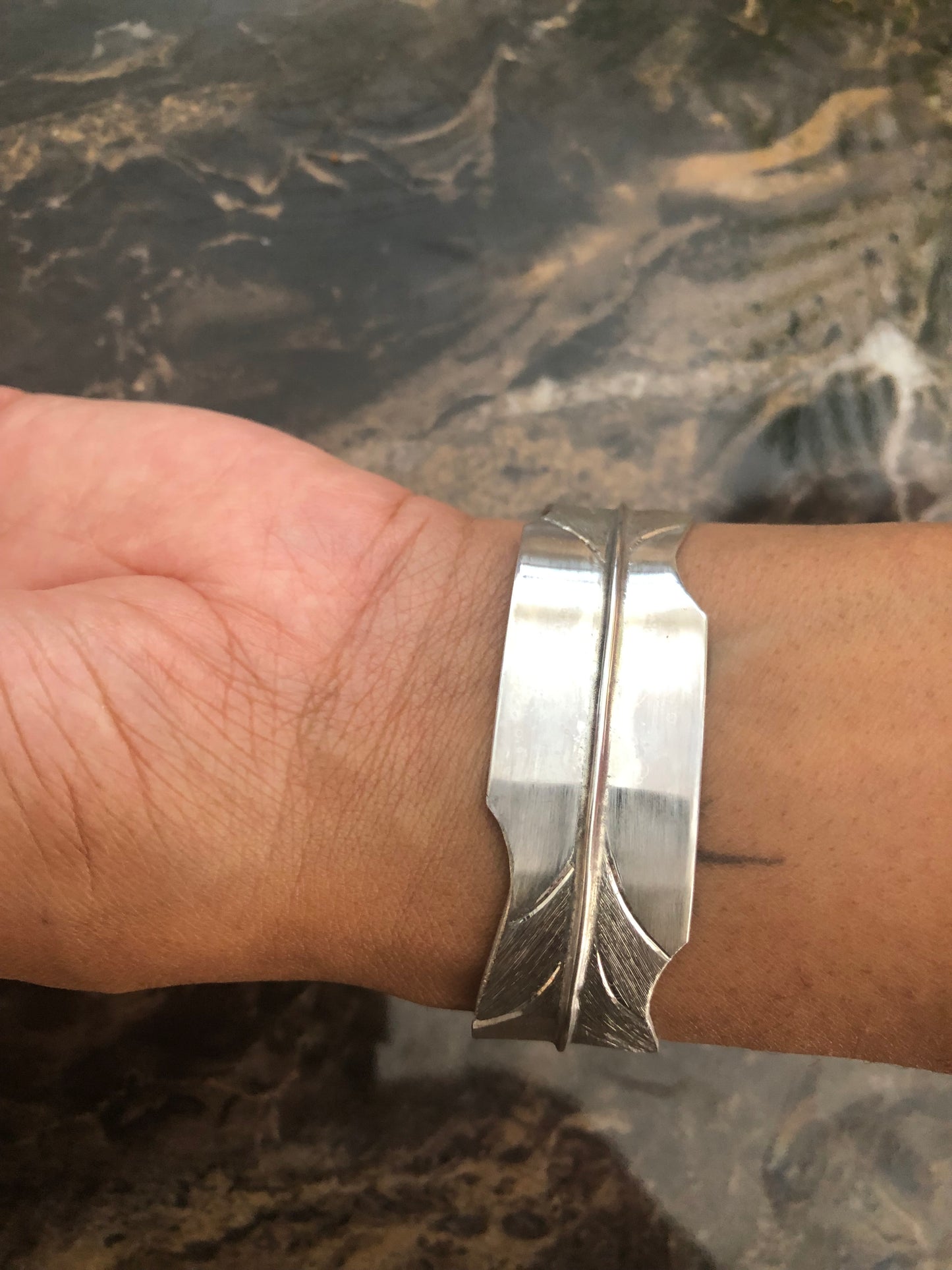 Ladies solid silver feather bangle
