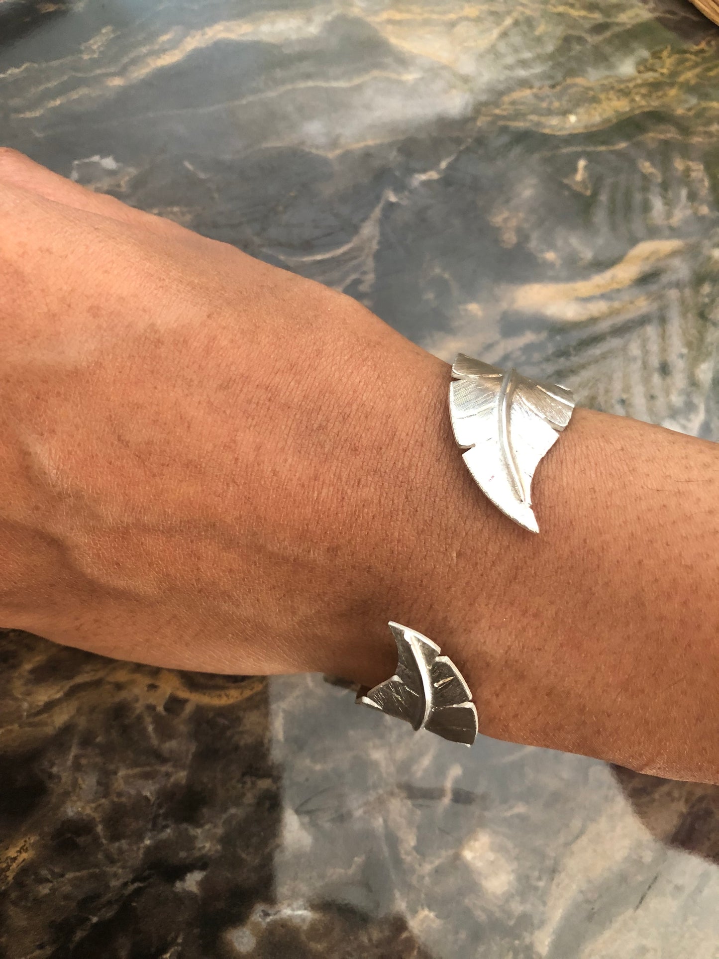 Ladies solid silver feather bangle