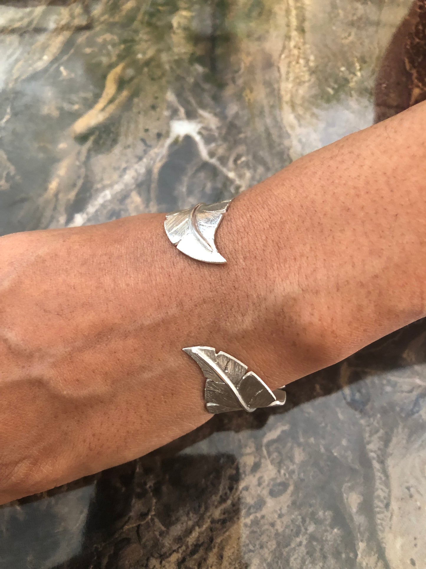 Ladies solid silver feather bangle