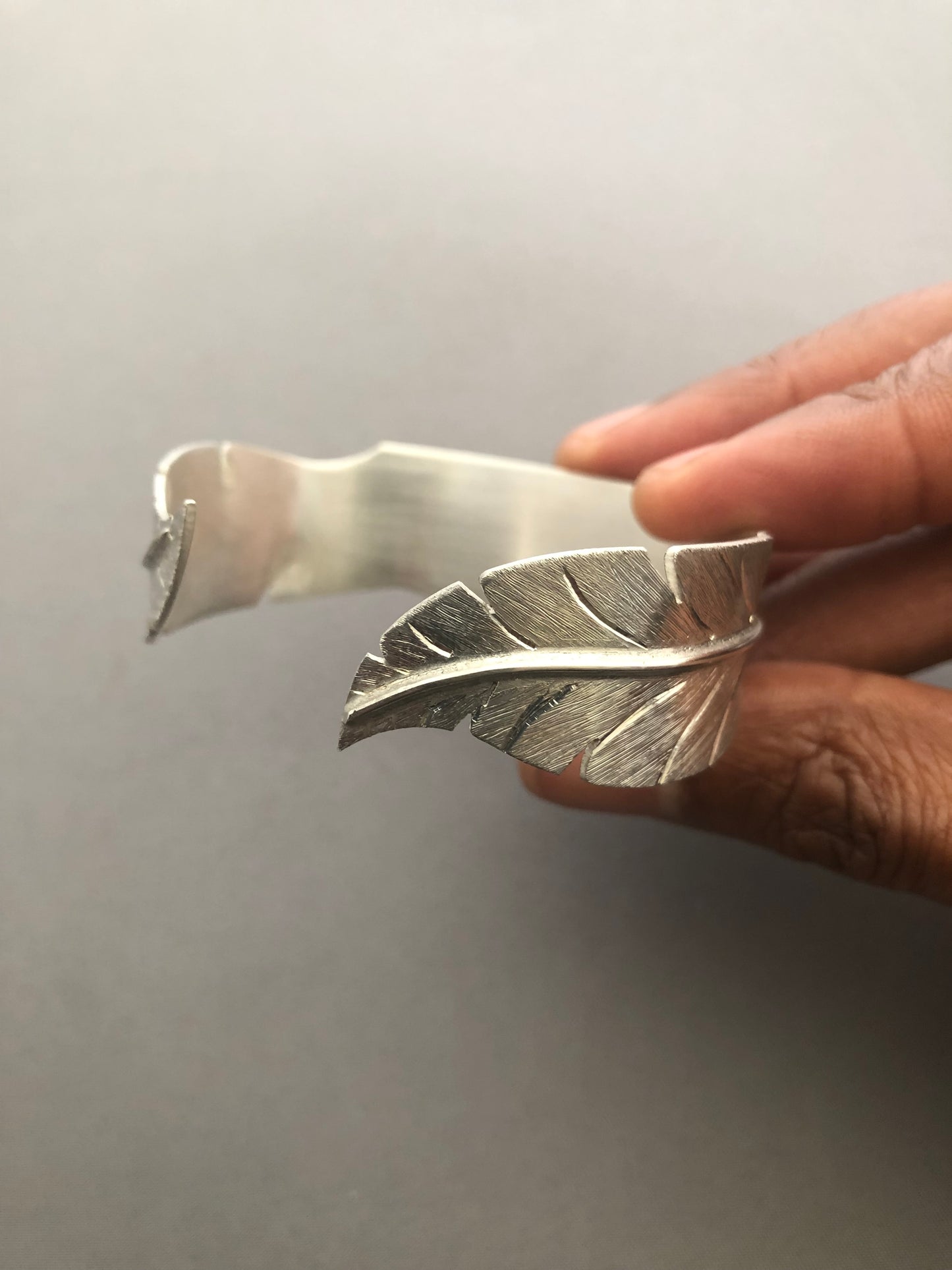 Ladies solid silver feather bangle