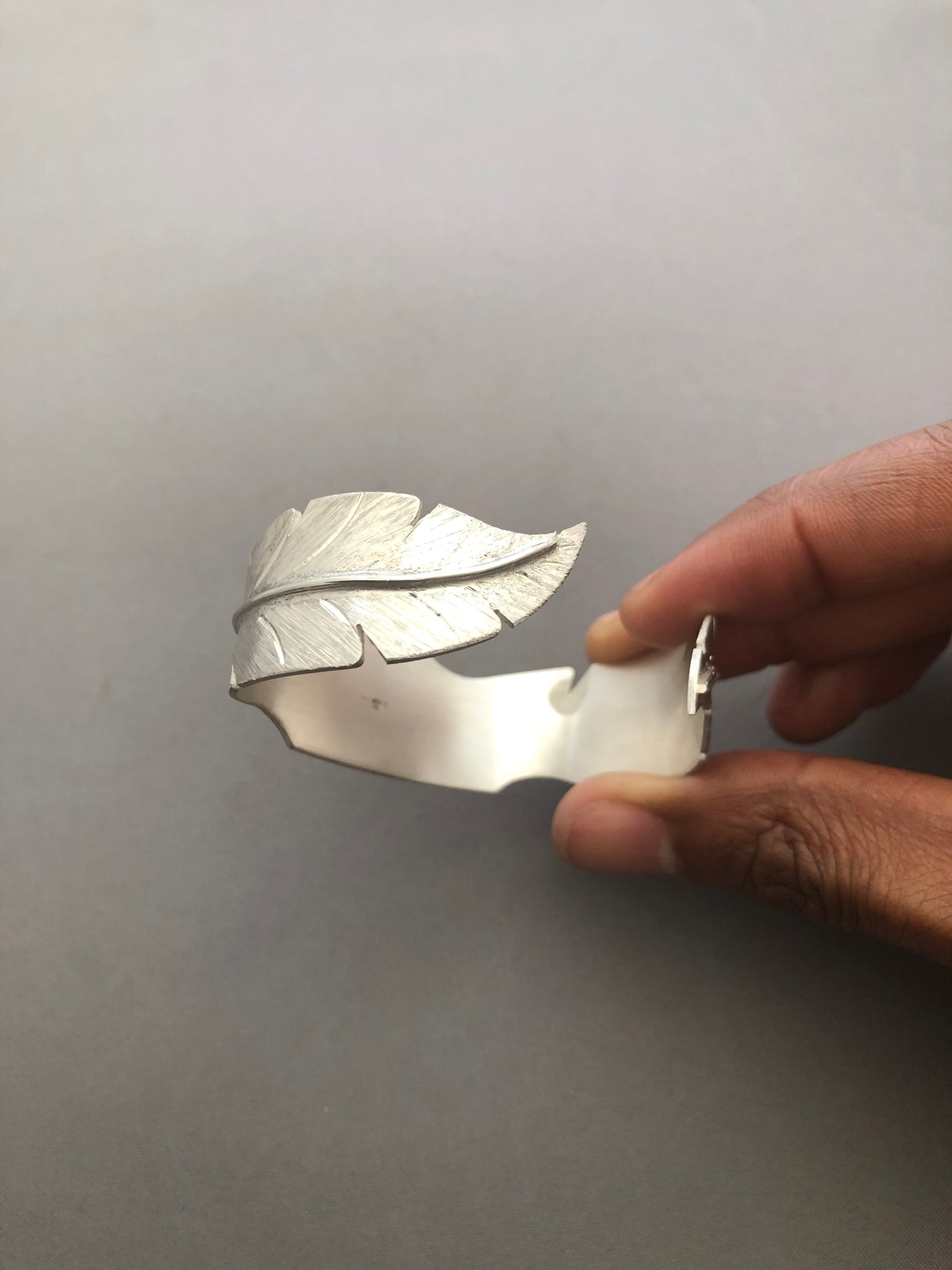 Ladies solid silver feather bangle