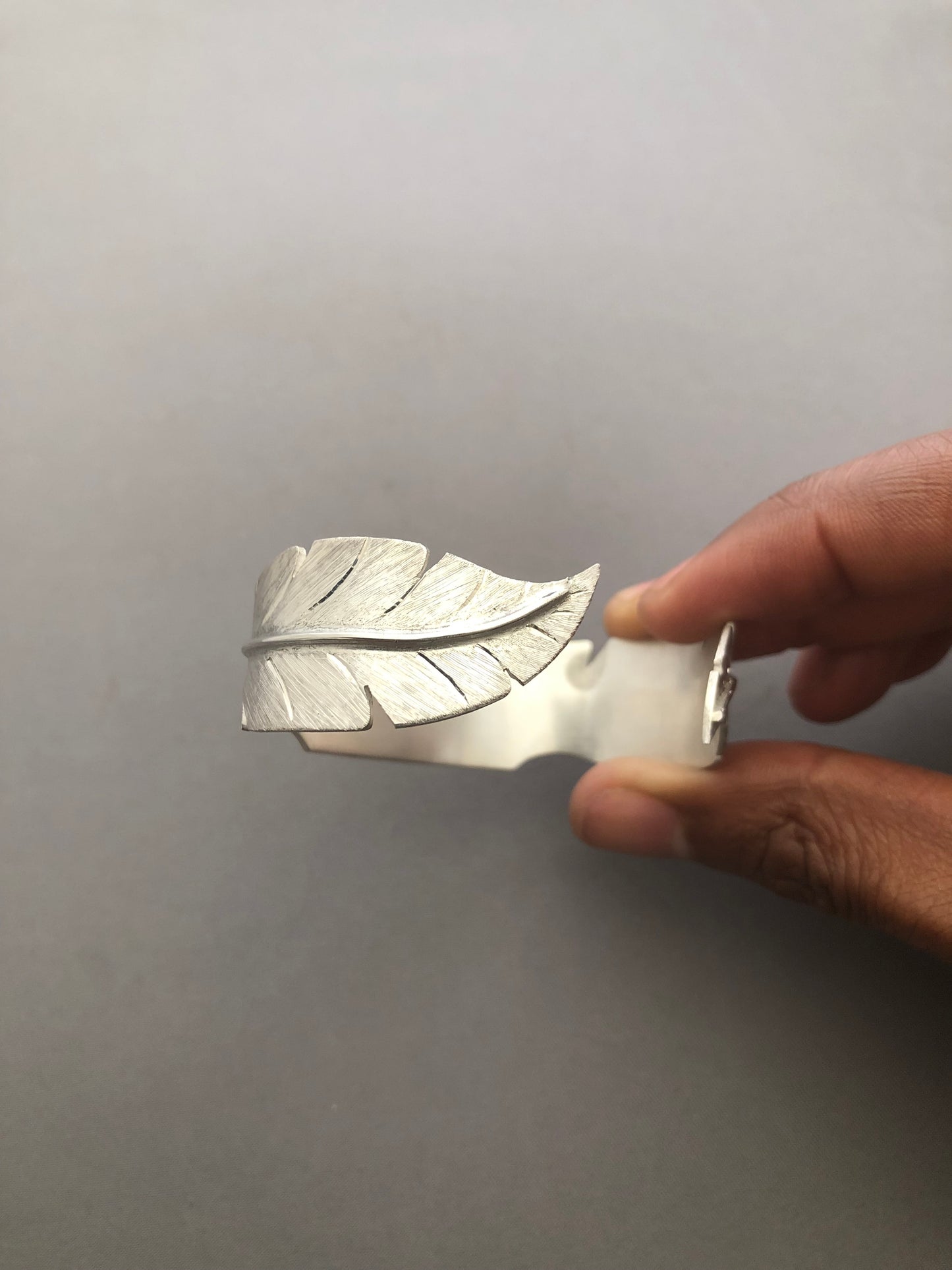 Ladies solid silver feather bangle