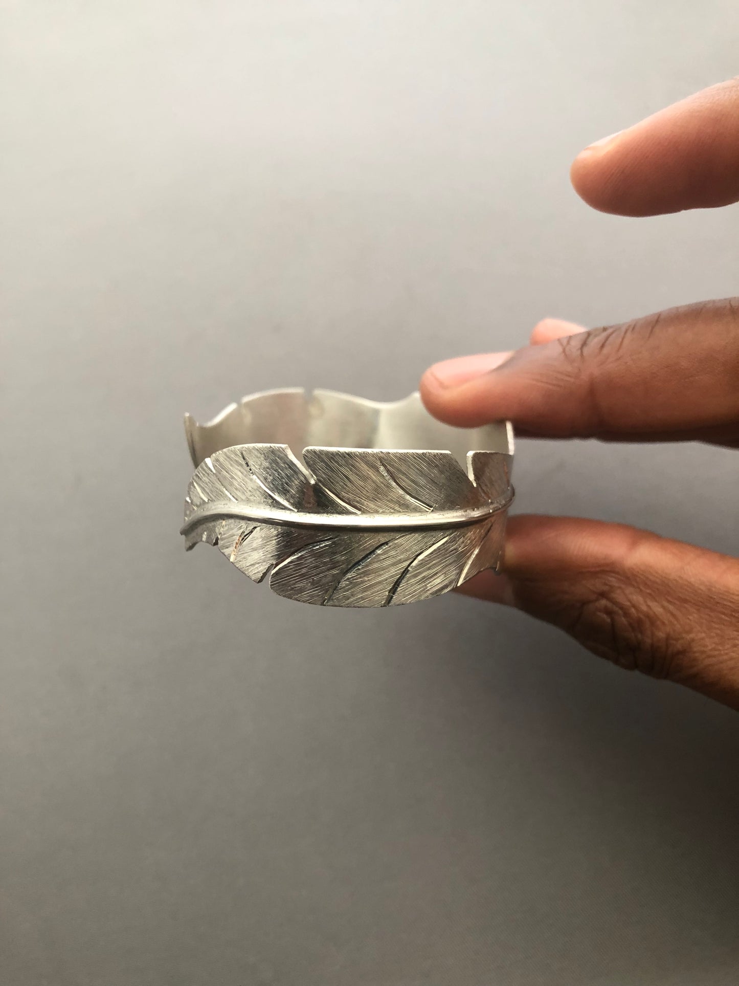 Ladies solid silver feather bangle
