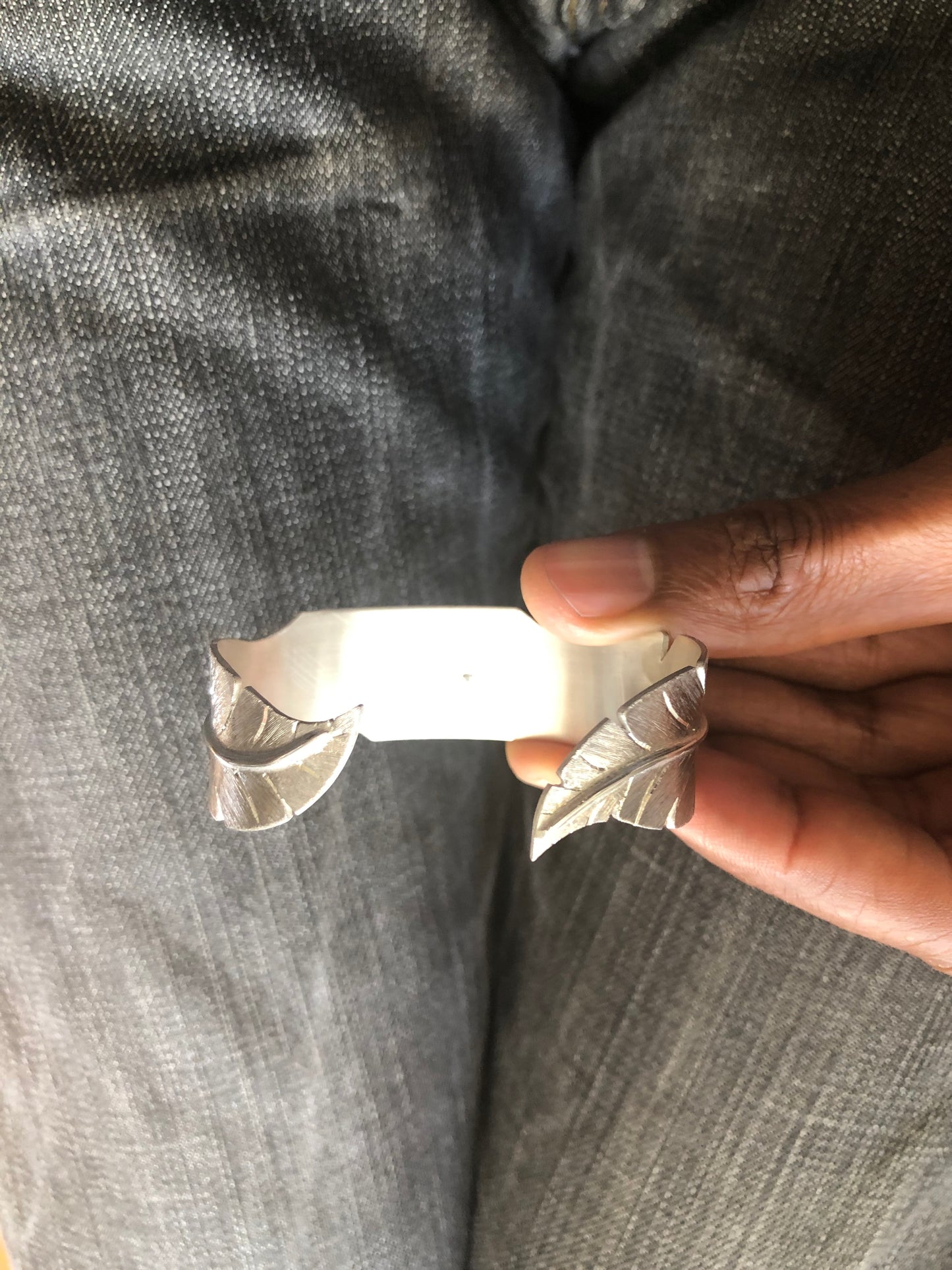 Ladies solid silver feather bangle