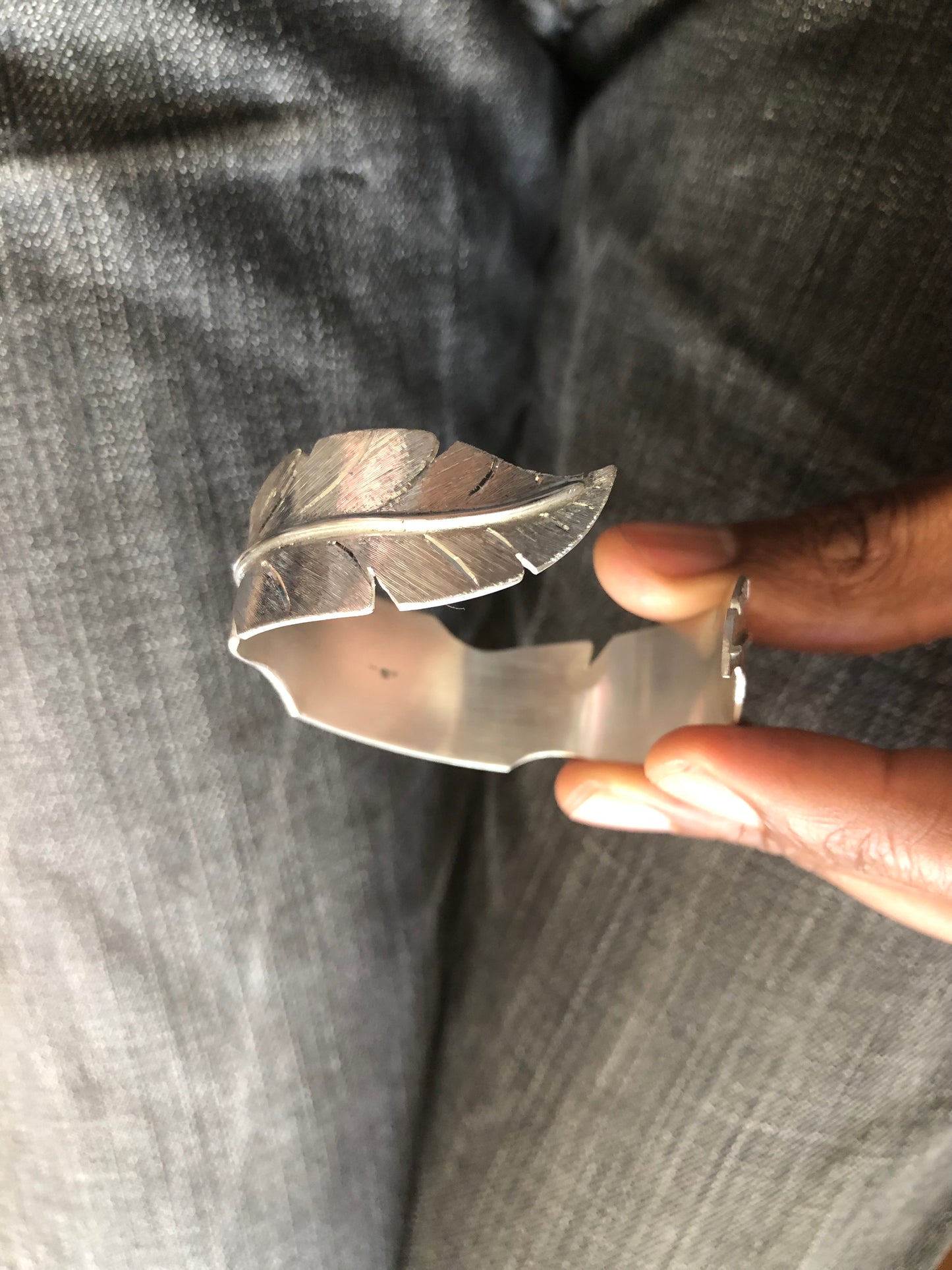 Ladies solid silver feather bangle
