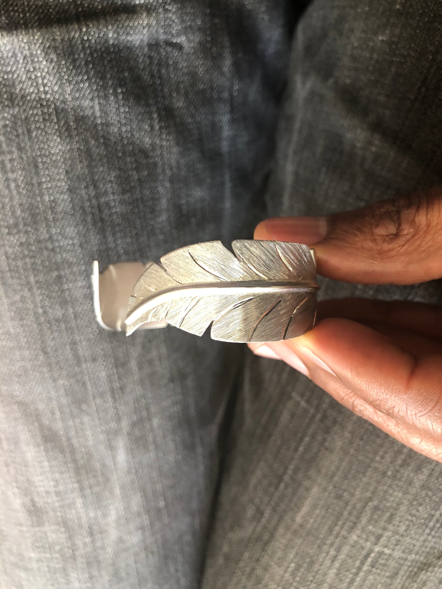 Ladies solid silver feather bangle