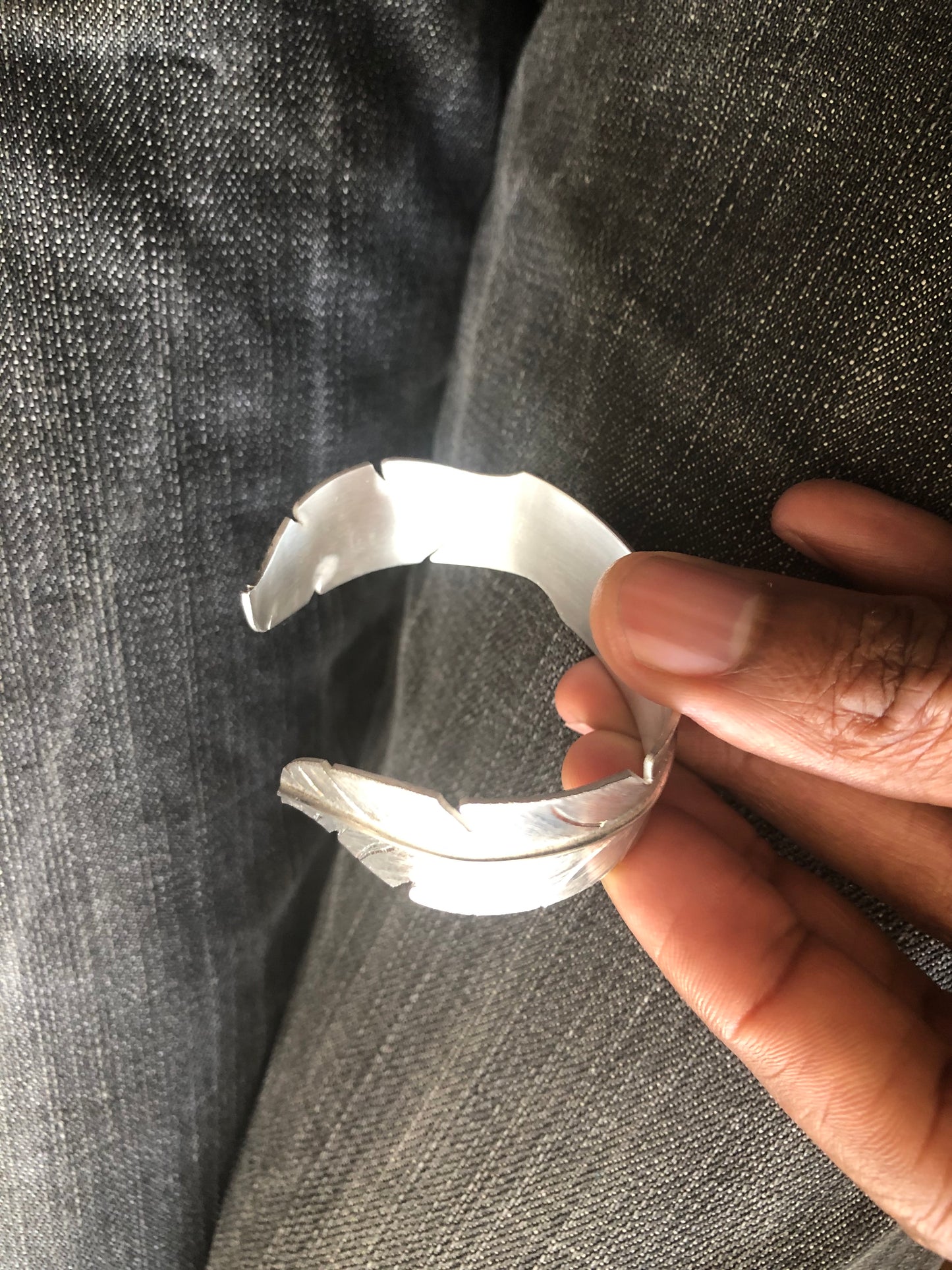Ladies solid silver feather bangle