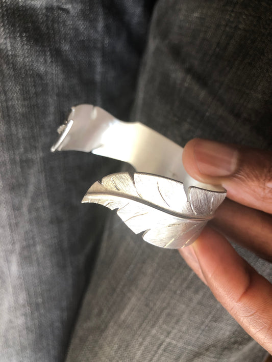 Ladies solid silver feather bangle